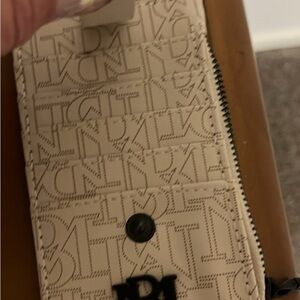 Badgley Mischka Beige and Black Vegan Leather Wallet Tag